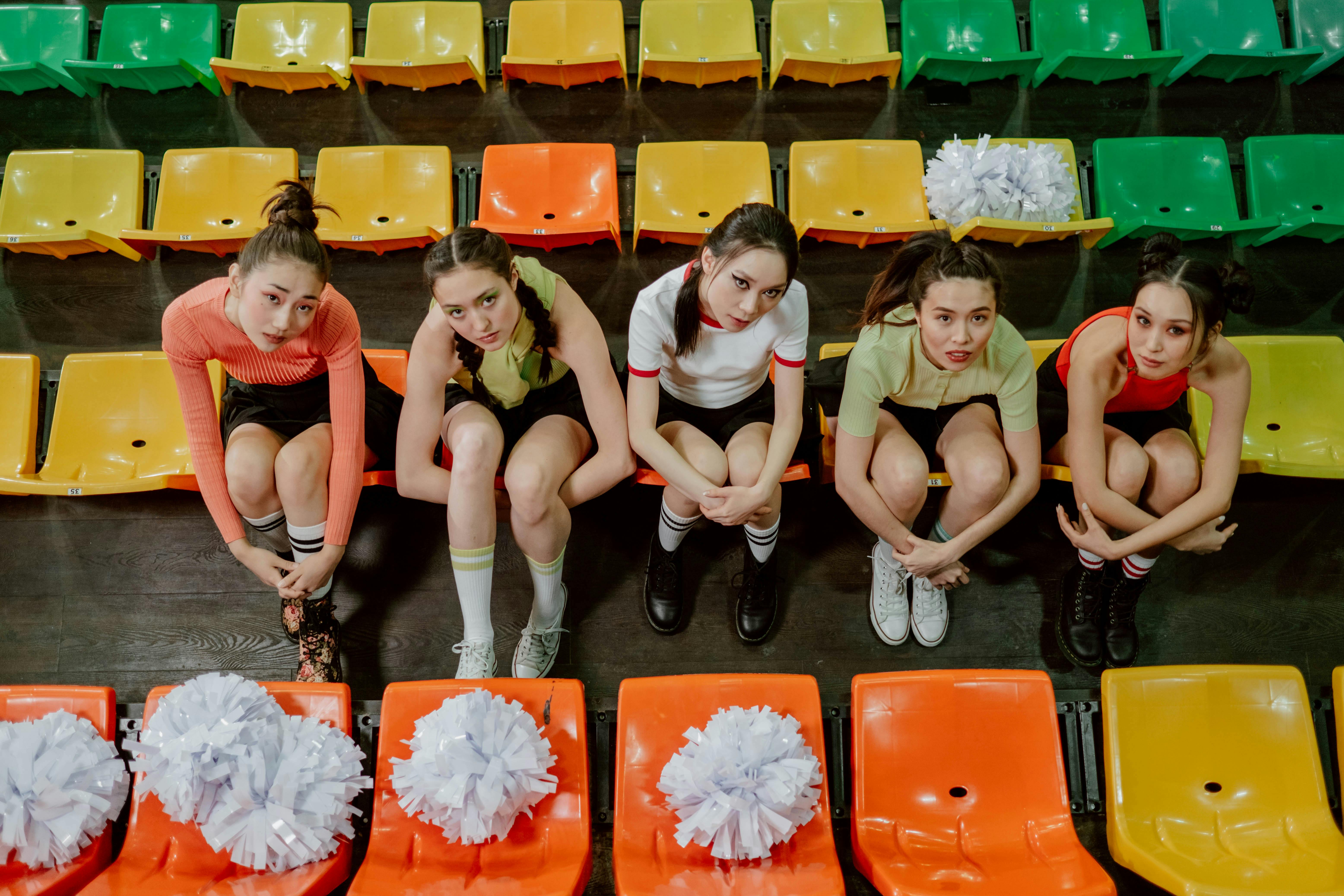 Cheerleader Woman Pompons Basketballs Sitting On Stock Photo