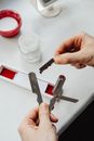 Photo of a Person's Hands Assembling a Razor