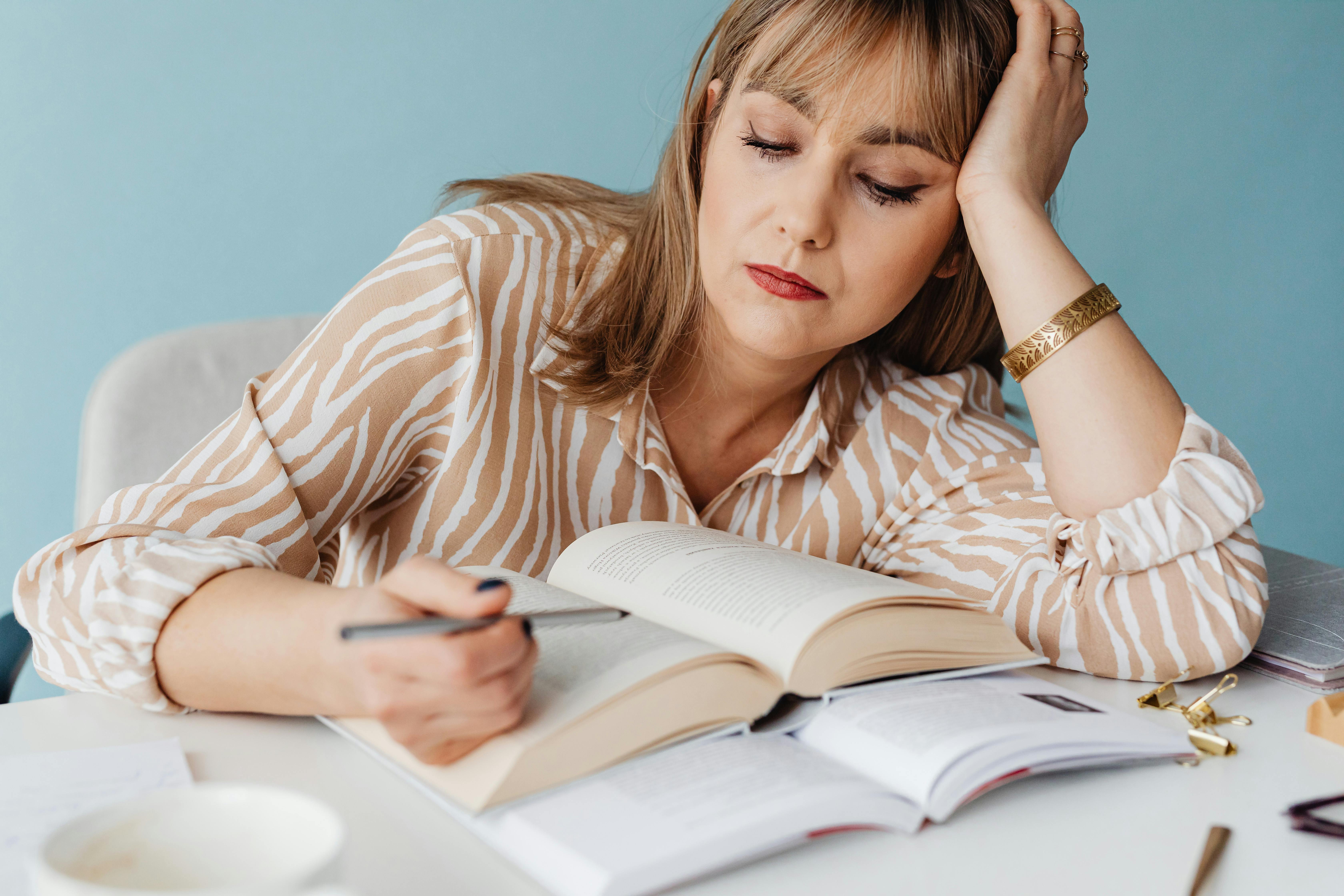 Woman with Bangs Reading a Book