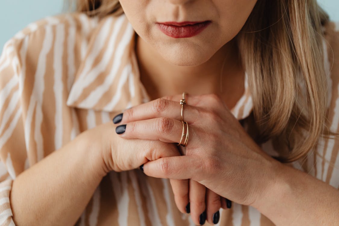 woman-with-clasped-hands