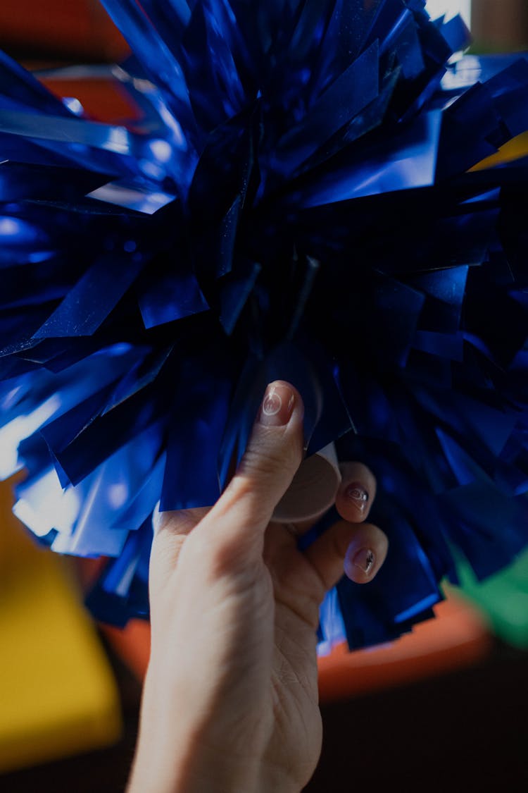 A Close-Up Shot Of A Blue Pompom