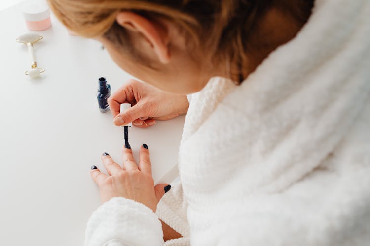 Woman Painting Her Nails 