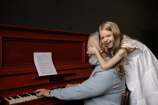 Joyful moment as granddaughter surprises grandfather at the piano, surrounded by love and music.