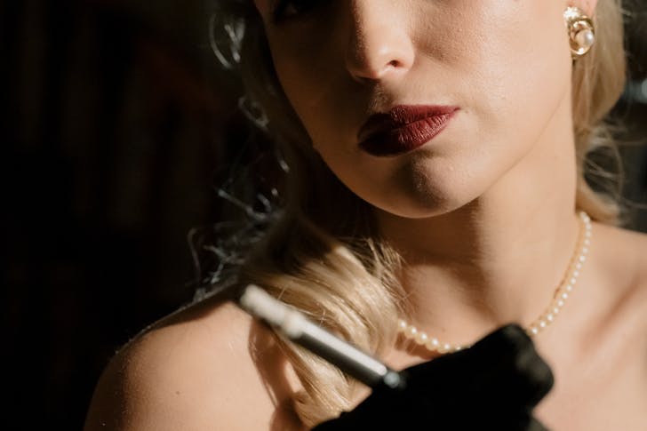 Close-Up Photo of Woman Wearing Red Lipstick