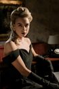Photo of an Elegant Woman Wearing Black Dress