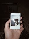 A Person Holding A Photo
