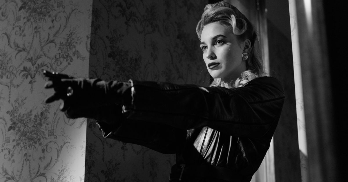 Hulu's 'Furious' Starring Emmy Rossum Earns Strong Reviews as a Standout Thriller Cinematic black and white portrait of a mysterious femme fatale in vintage style.