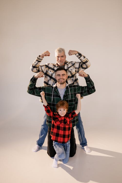 A Family Showing Off Their Muscles