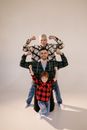 A Family Showing Off Their Muscles