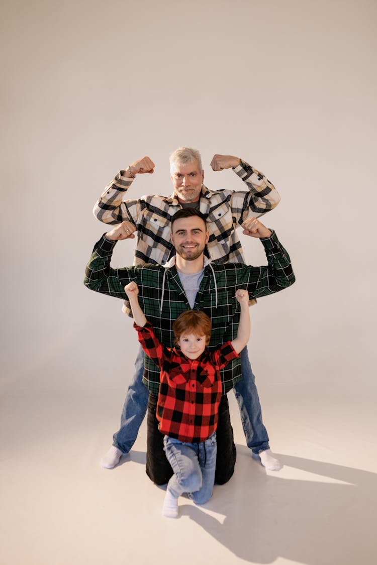 A Family Showing Off Their Muscles