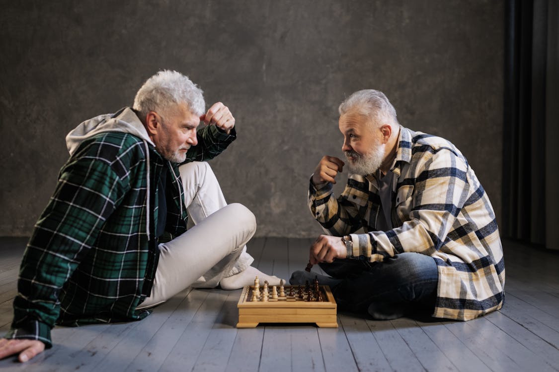 Elderly Men Playing Chess