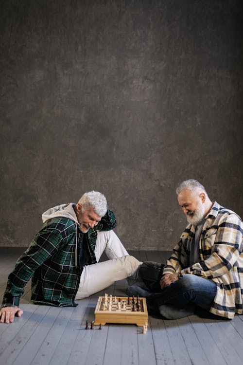 Elderly Men Playing Chess