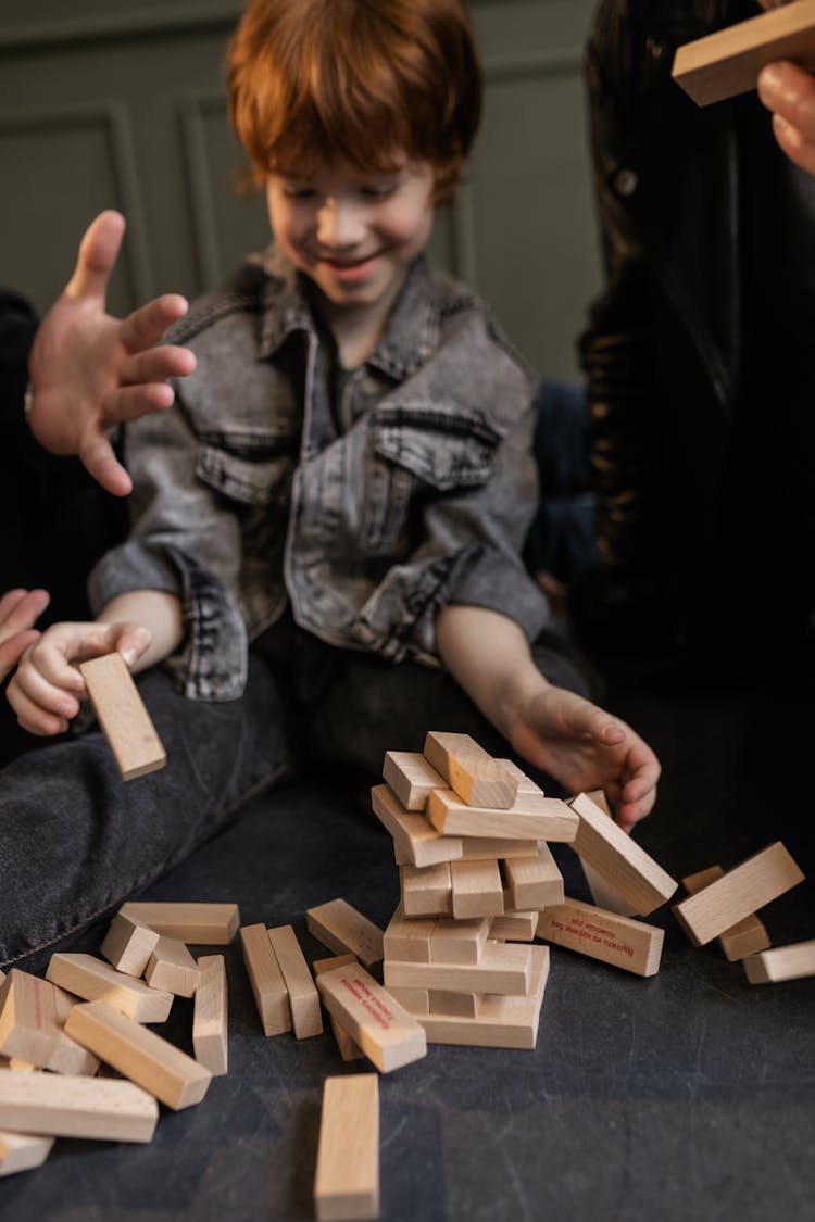 A Family Playing Jenga