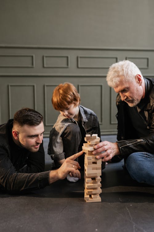 Free A Family Playing Jenga Stock Photo