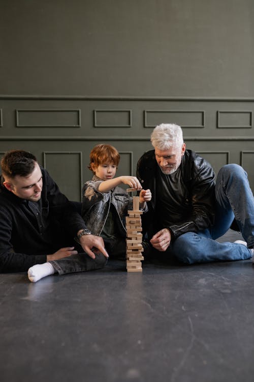 Free A Family Playing Jenga Stock Photo