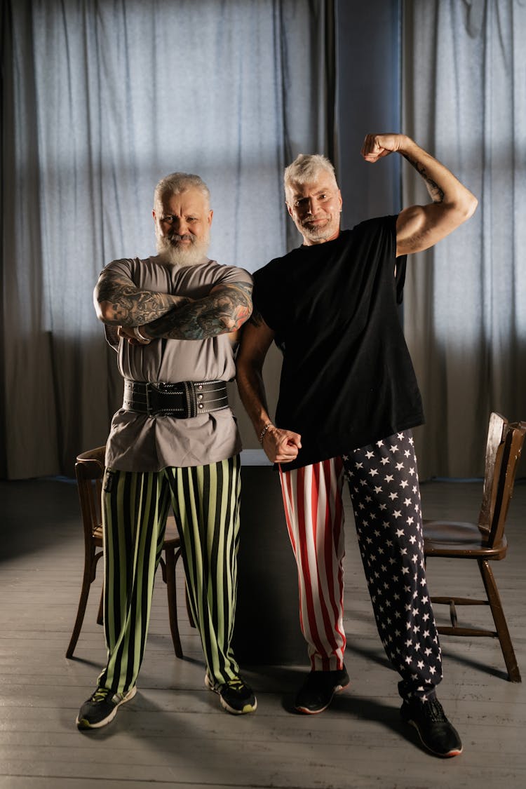 Elderly Men Showing Off Their Muscles