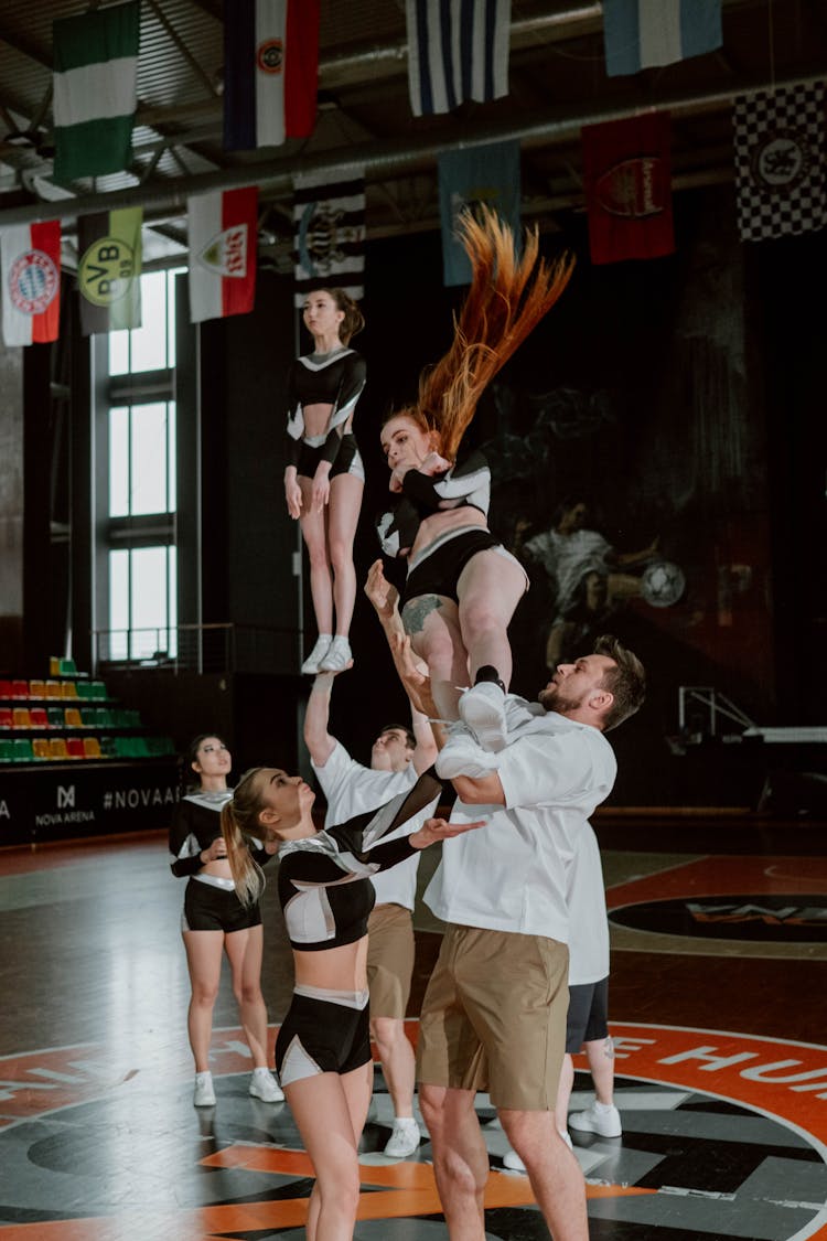 Group Of People Rehearsing A Dance Move