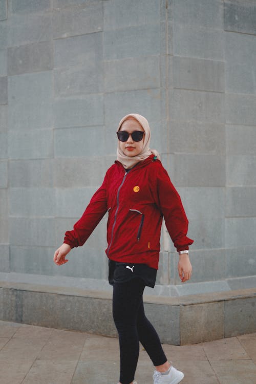 Young Woman Wearing Hijab, Sunglasses and Sports Clothing 
