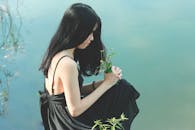 Woman's Black Dress Photo