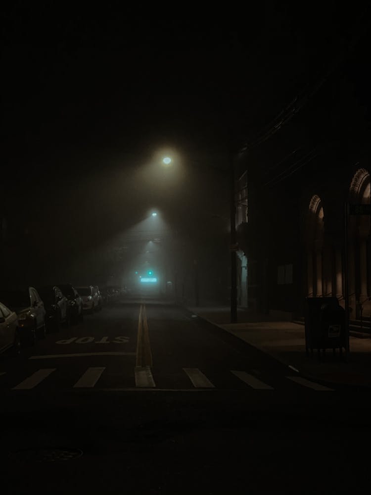 Cars Parked On Asphalt Road Inc City At Night