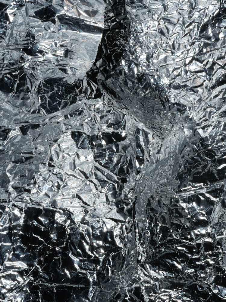 Close-up Of A Creased Tin Foil