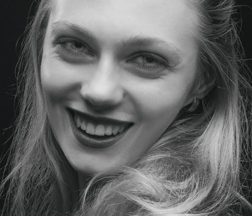 Black and White Portrait of a Woman Smiling