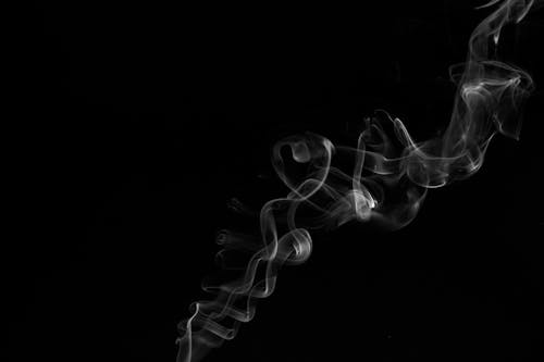 Photo of White Smoke on Black Background