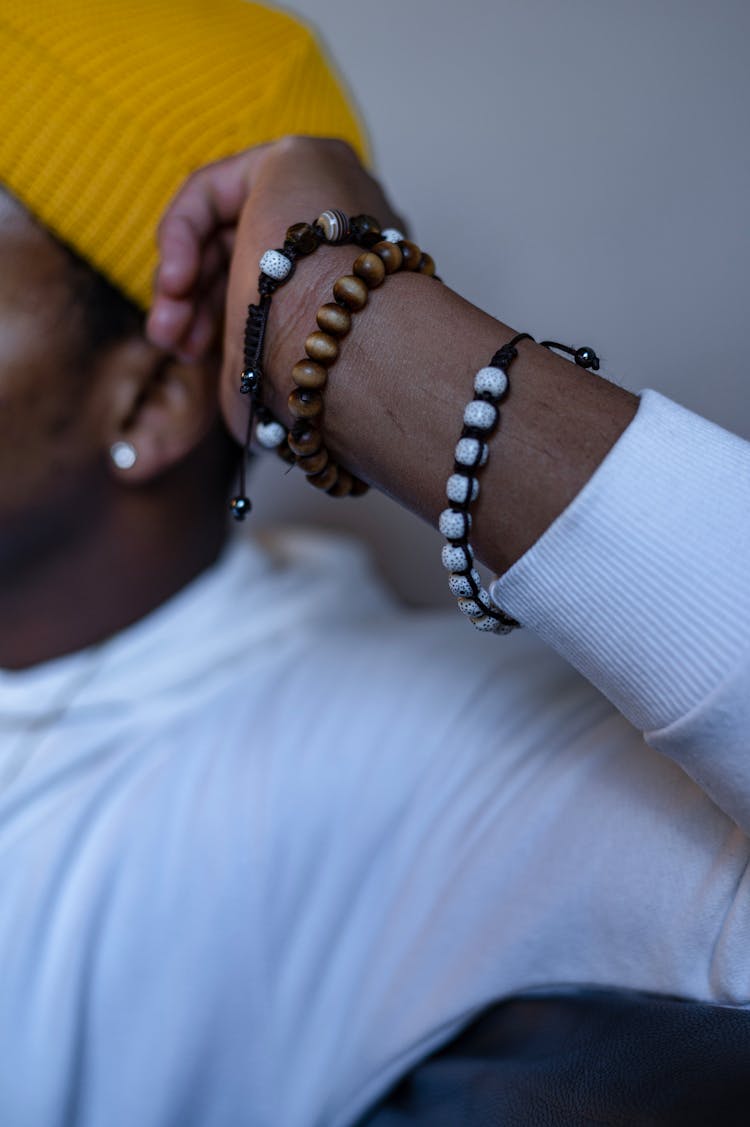 Person Wearing Beaded Bracelets