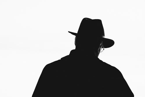 Free Silhouette of Man Wearing Panama Hat Stock Photo