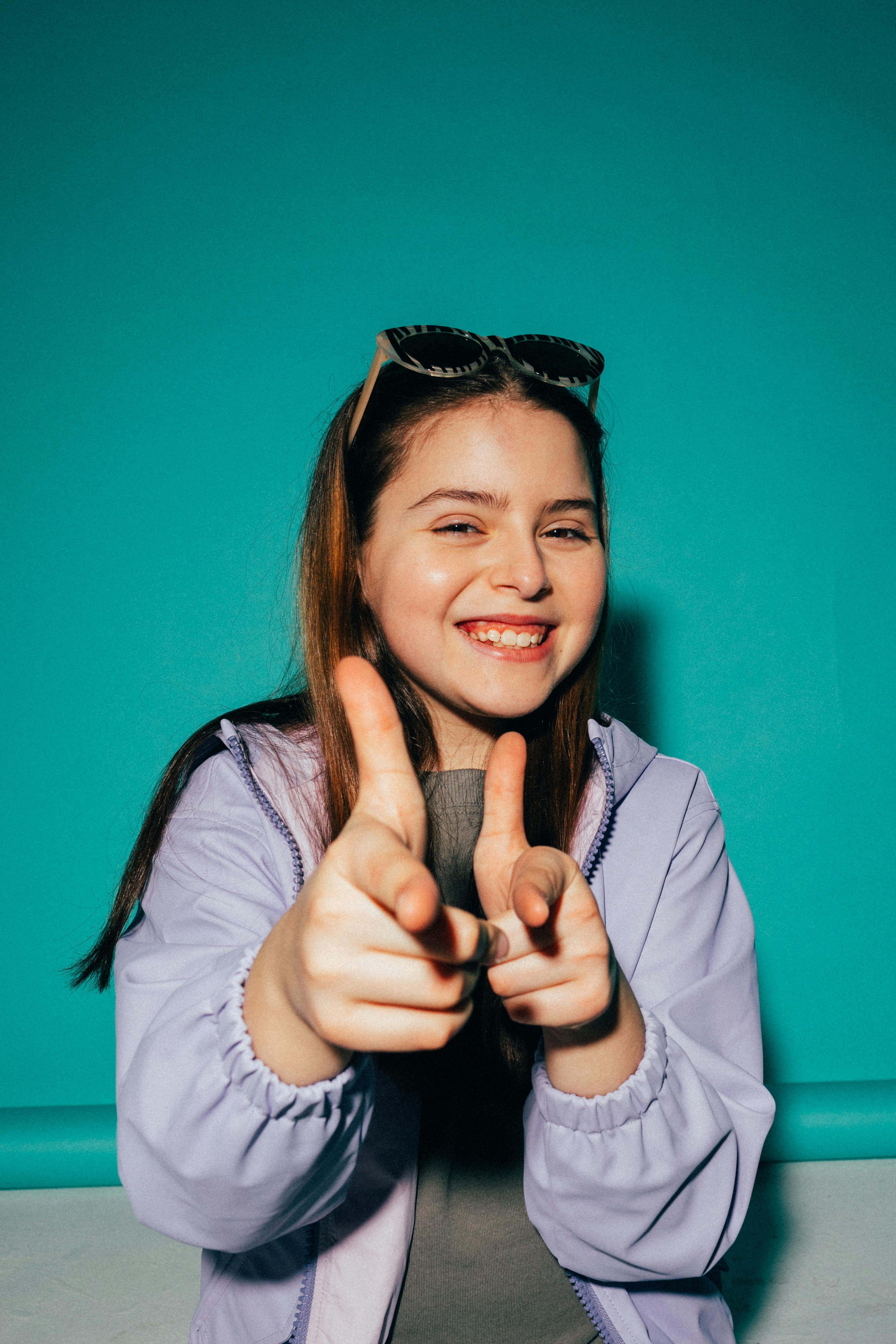 girl wearing a jacket posing