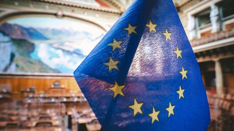 Close-up of the European Union flag inside the Swiss Parliament's National Council chamber in Bern.
