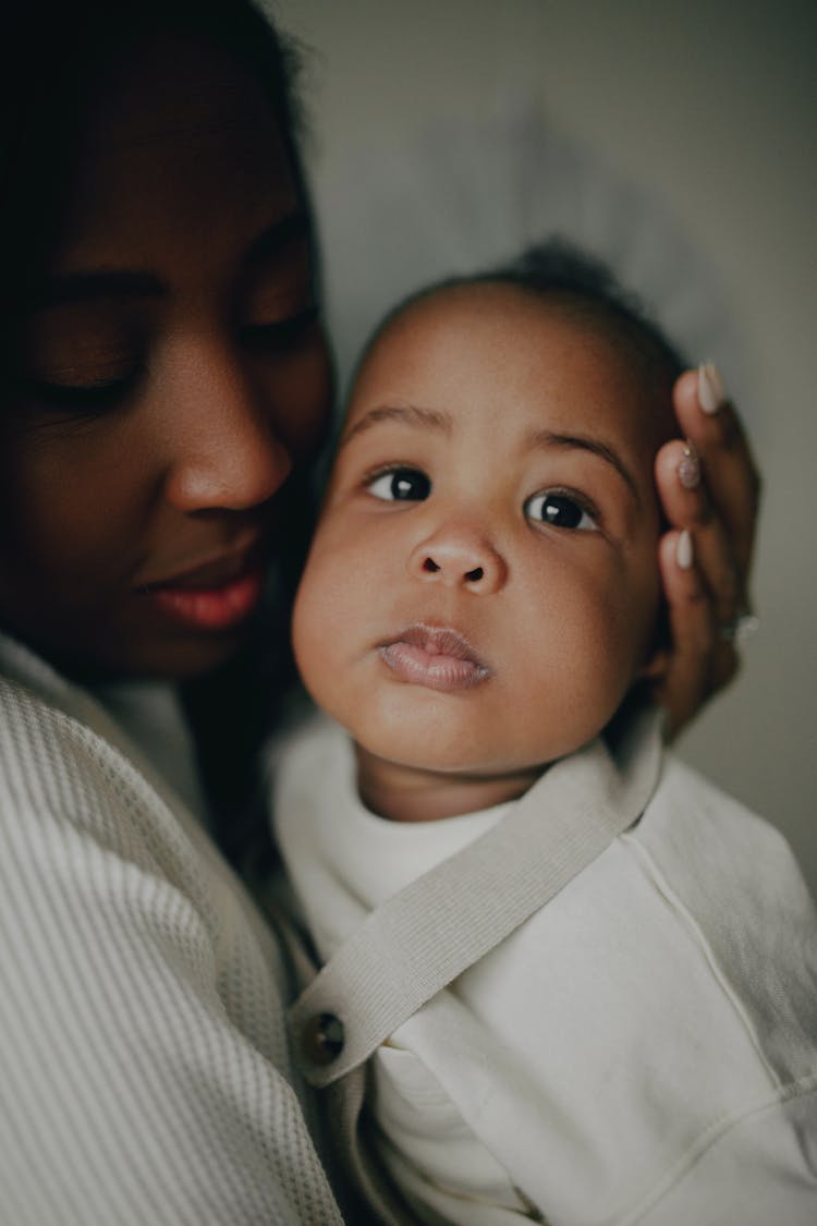 Woman Hugging Baby