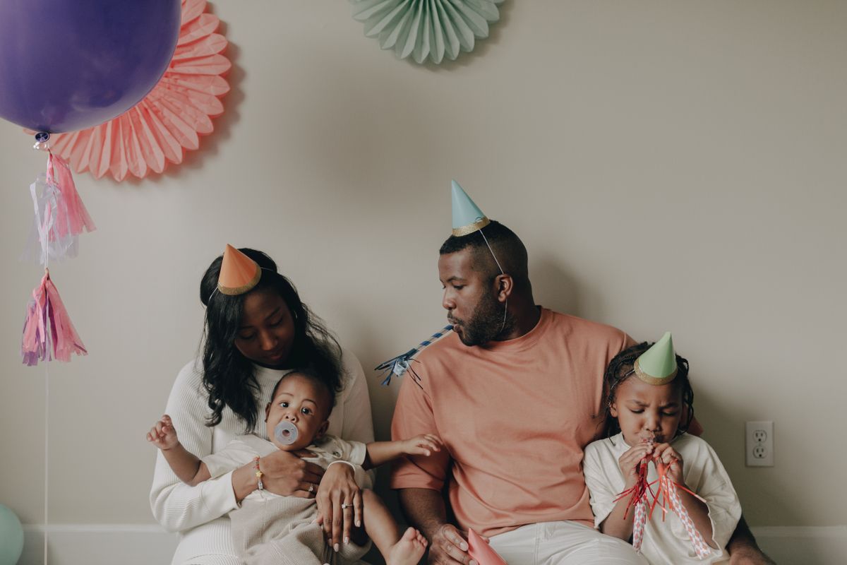 Parents and children enjoying a birthday celebration