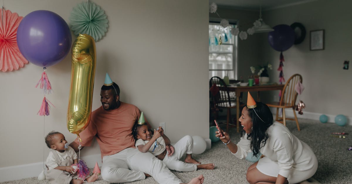 Happy Family with Children Celebrating Birthday at Home