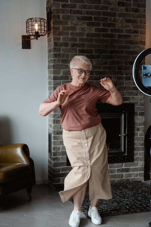 Woman Dancing In Front of a Phone