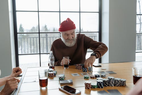 Free Man Playing Poker Stock Photo