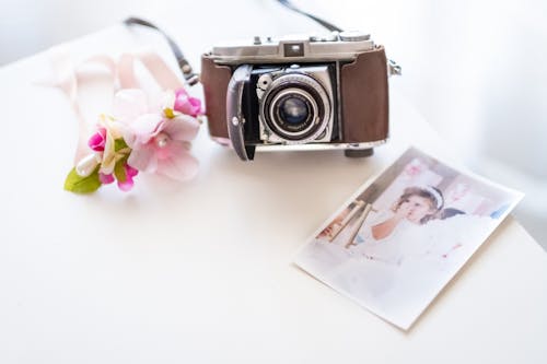 Free Vintage Camera and a Photo of a Girl  Stock Photo