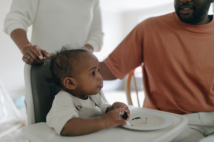 Photo Of A Baby Eating A Cake