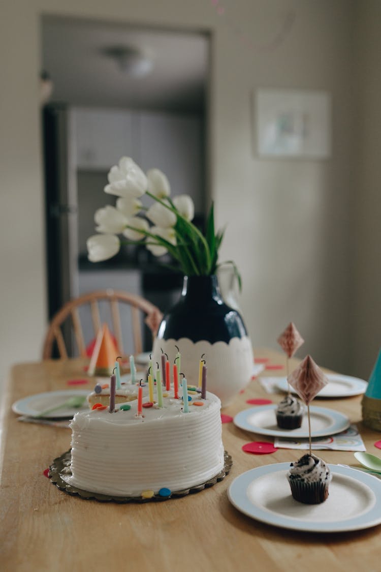 Birthday Cake On Table In Apartment