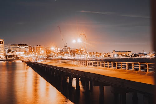 Bridge over Body of Water during Night Time