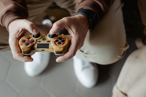 Free Man Holding a Game Console Stock Photo