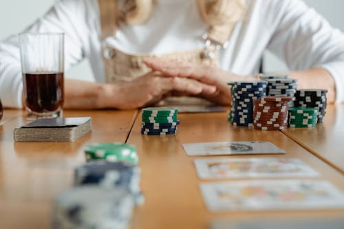 Playing Cards on Wooden Table