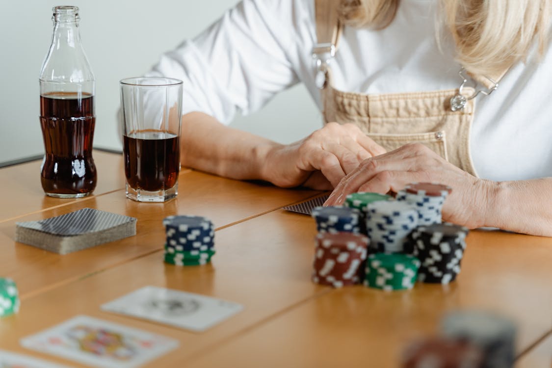 Free Woman Playing Poker Stock Photo