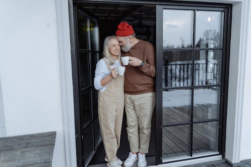 Couple Standing by the Door