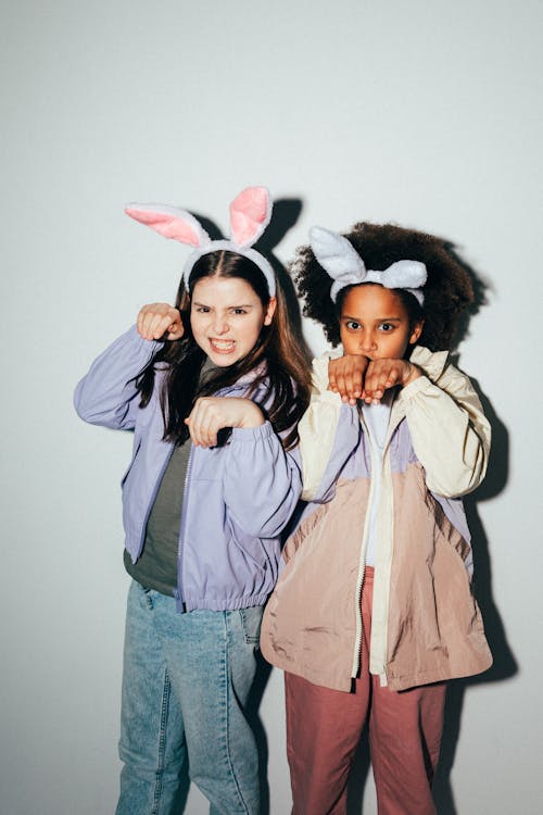 Girls Wearing Bunny Ears Posing
