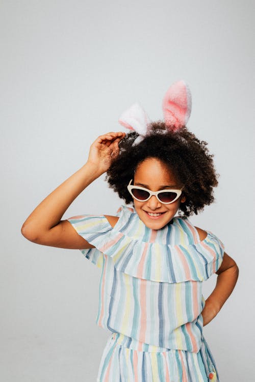 Girl in Striped Dress Wearing Bunny Ears