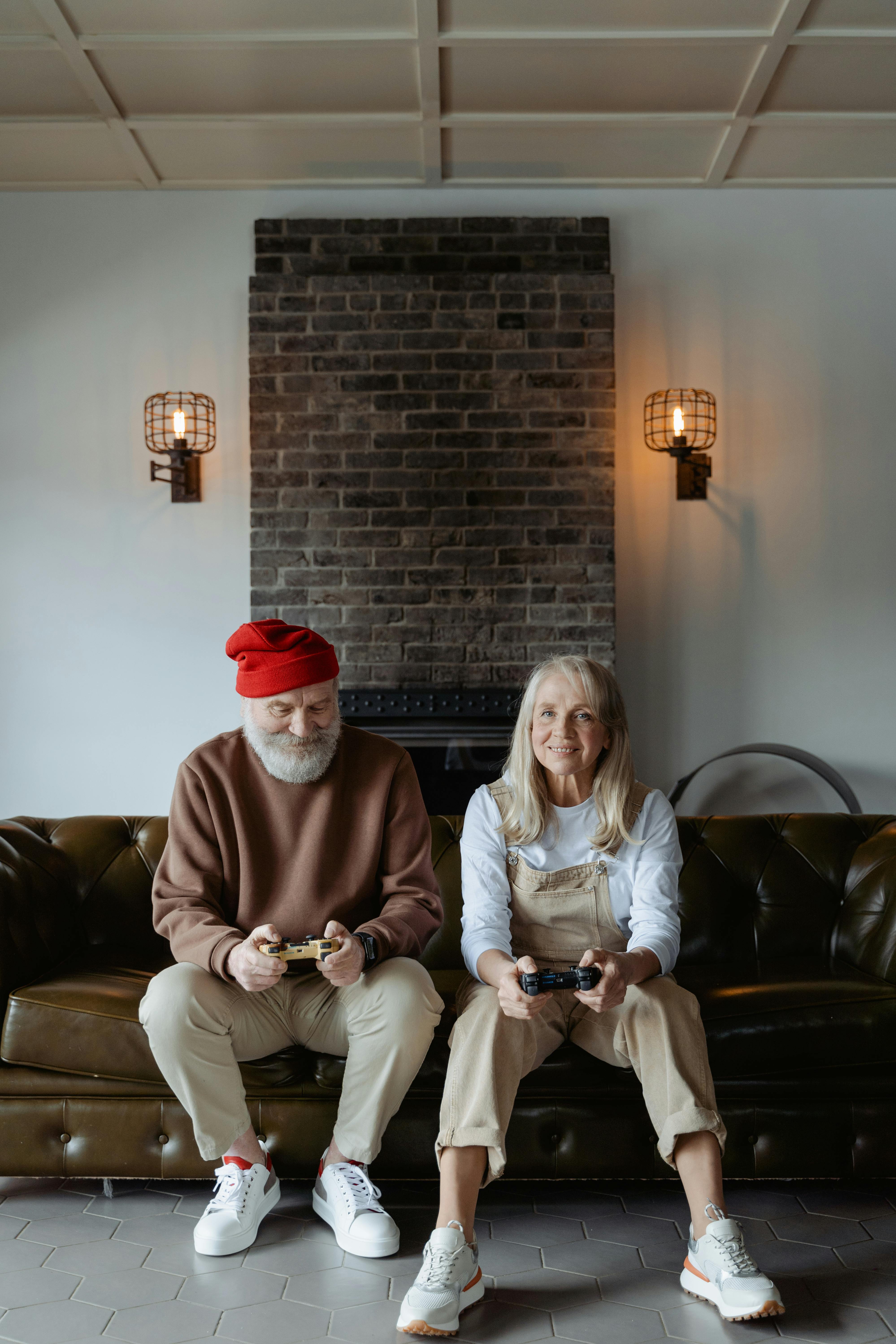 man and woman sitting on a sofa