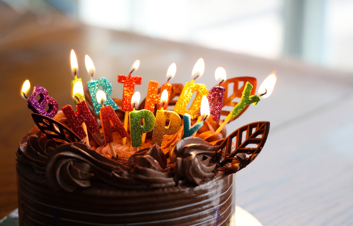 Free Chocolate Cake With Candles on Top Stock Photo