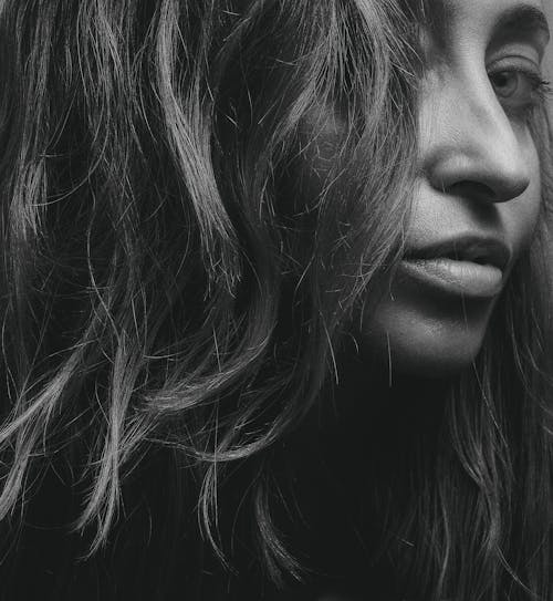 Grayscale Photo of Person's Face