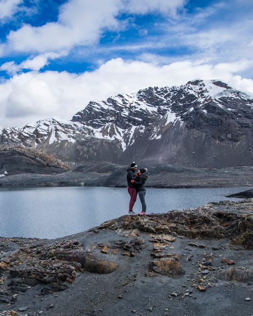 
A Couple Hugging by the Lake